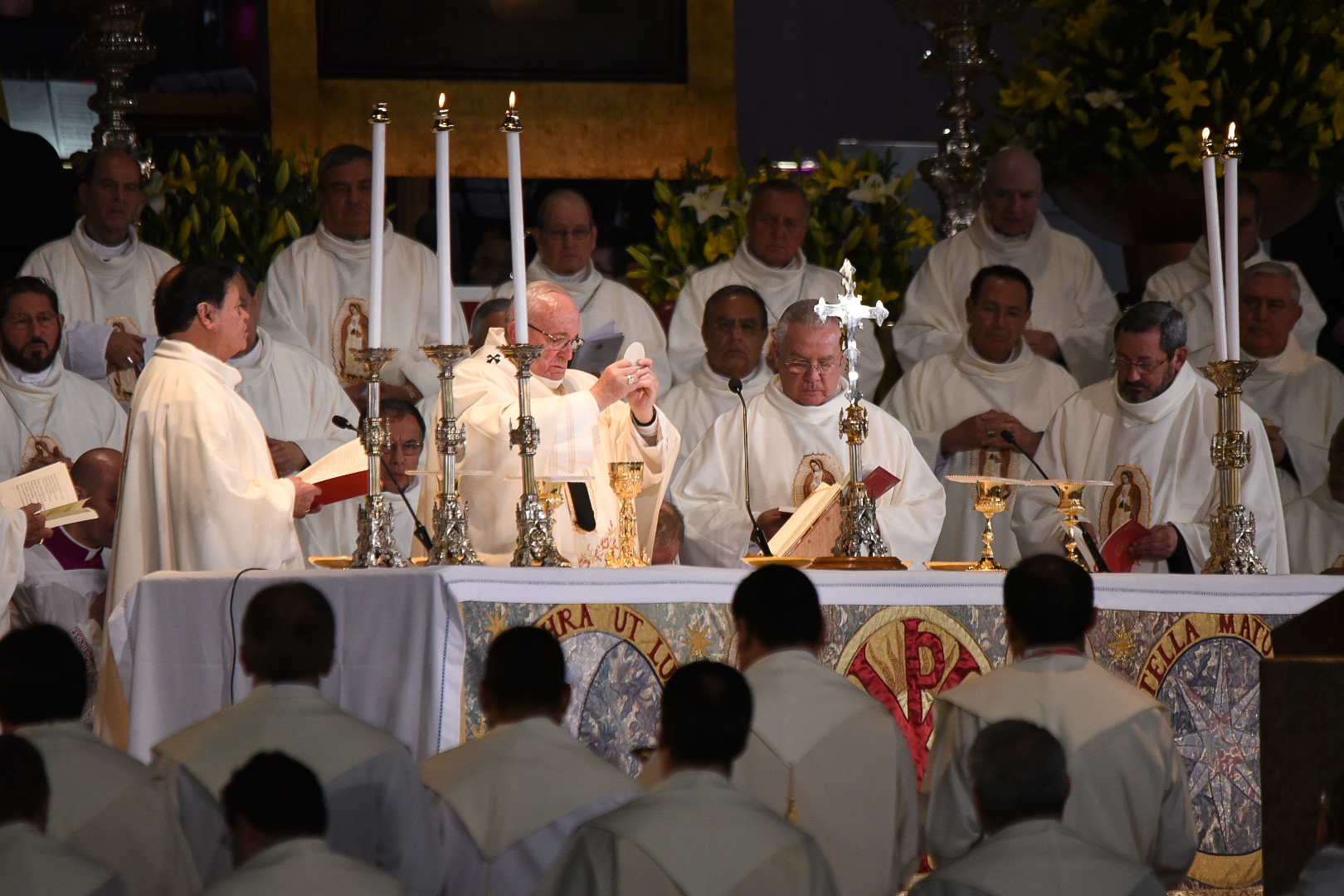 Pope Francis Holds Up the Eucharist while Celebrating Mass in Mexico